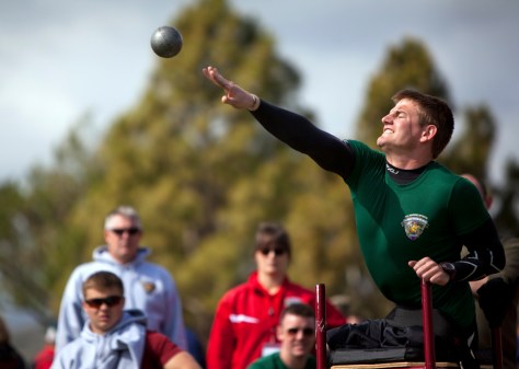 British Royal Marine Joe Townsend, a Wounded Warrior with the Allies Team, shot puts during the 2012 Marine Corps Trials, hosted by the Wounded Warrior Regiment, at Marine Corps Base Camp Pendleton, Calif., Feb. 19, 2012. Townsend, from Eastbourne, England, placed first in the 10-kilometer hand cycling competition and 200-meter wheelchair race. Wounded Warrior Marines, veterans and allies are competing in the second annual trials, which include swimming, wheelchair basketball, sitting volleyball, track and field, archery and shooting. The top 50 performing Marines will earn the opportunity to compete in the Warrior Games in Colorado Springs, Colo., in May.